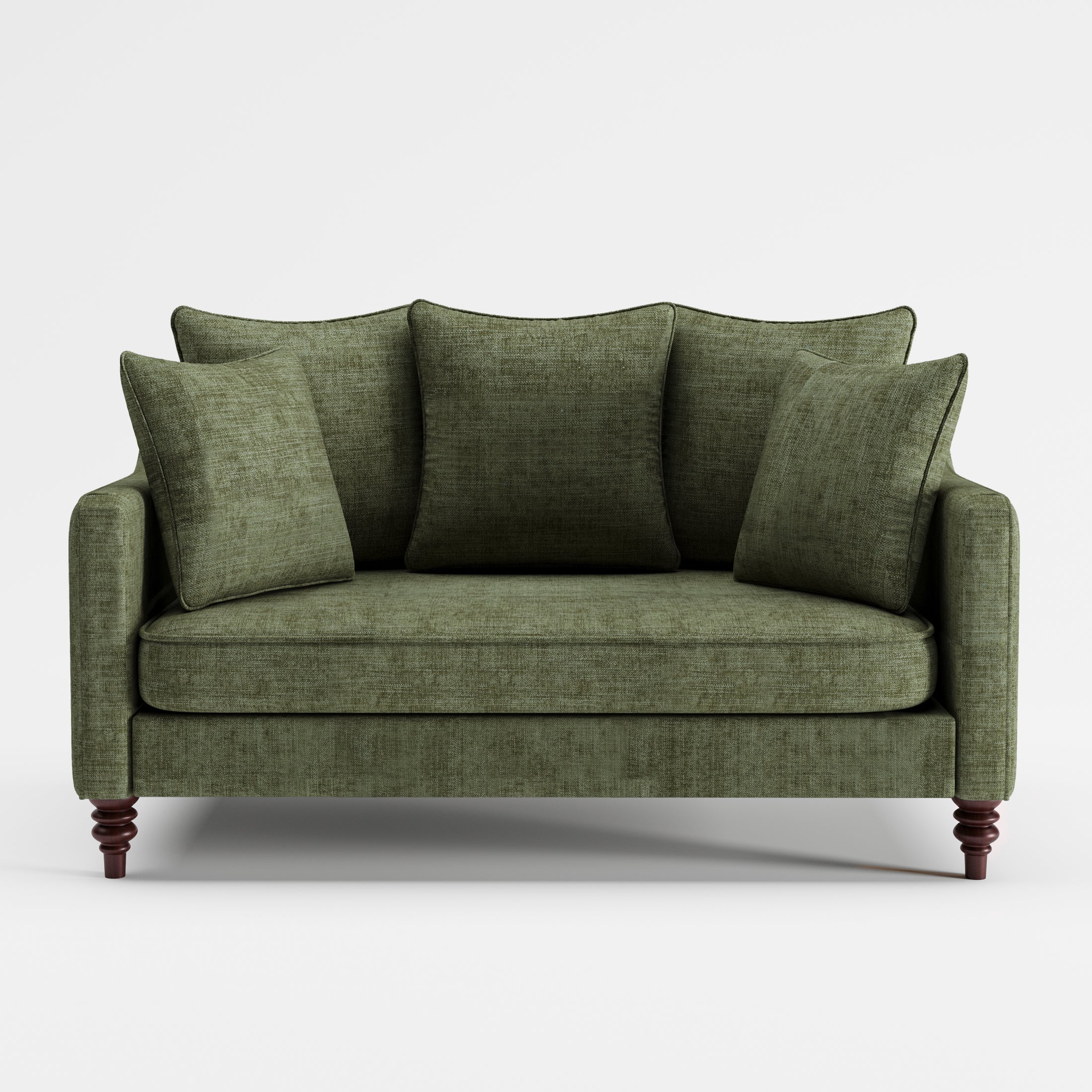 Green upholstered loveseat with matching throw pillows and turned wooden legs