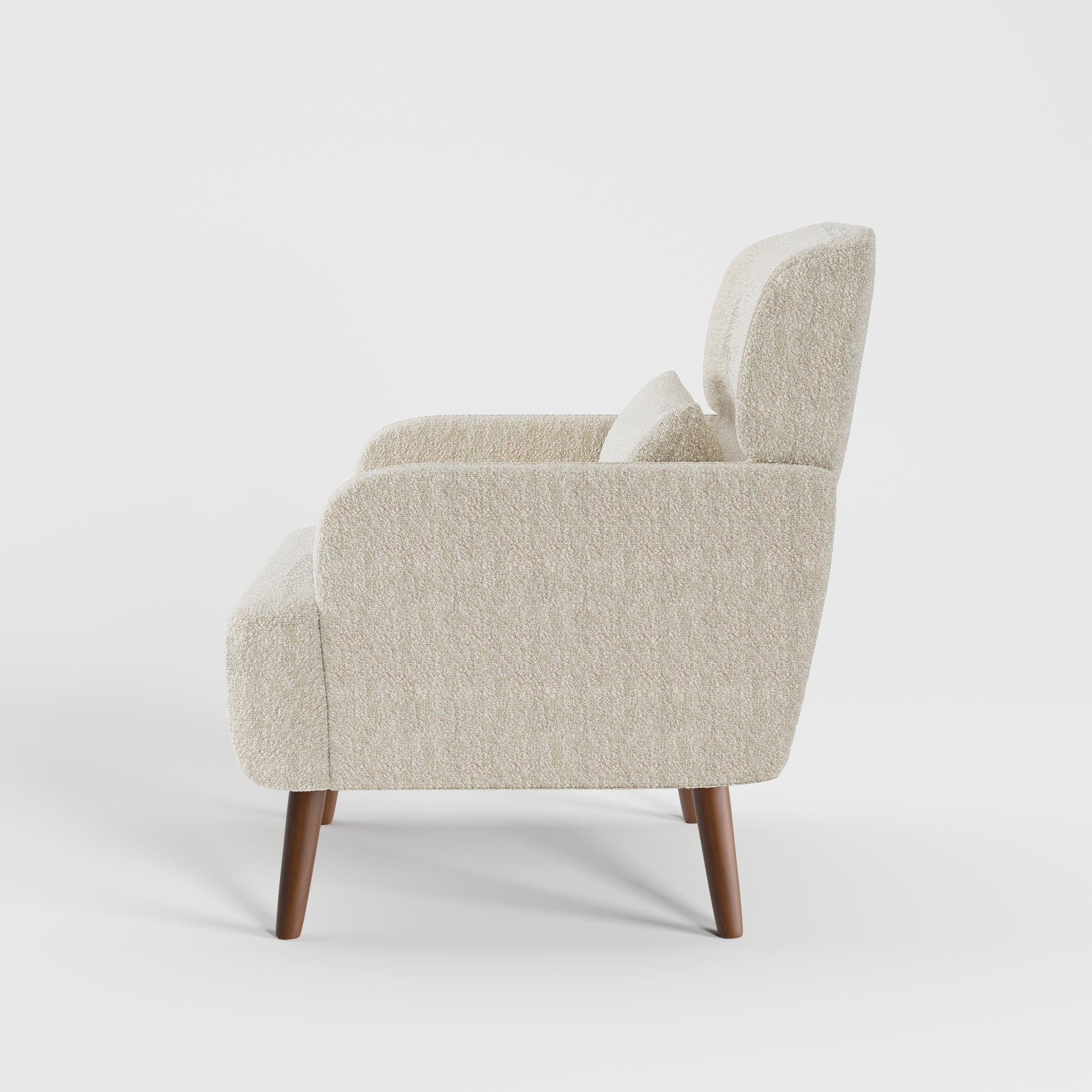 Arlo Accent Armchair in Ivory Tweed Color shown from the side, showcasing its deep seat, supportive backrest, rounded arm design, and solid wood legs.